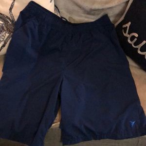 Athletic shorts with side zippered pocket